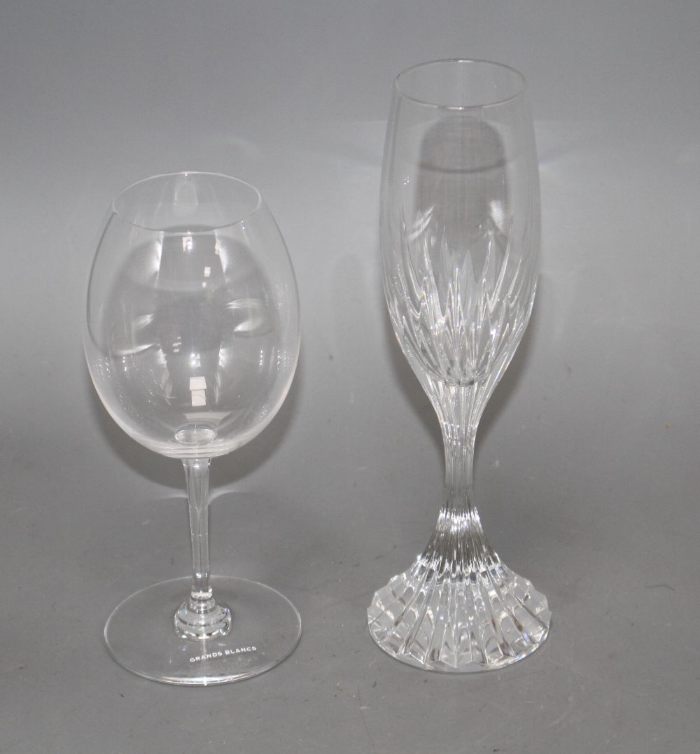 A boxed set of six Baccarat cut glass champagne flutes, height 21.5cm and a boxed pair of Baccarat Grands Blancs wine glasses, height 1